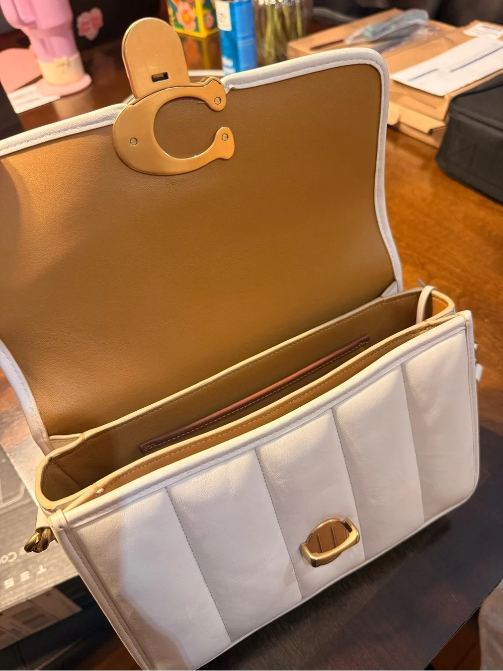 Coach elegant cream